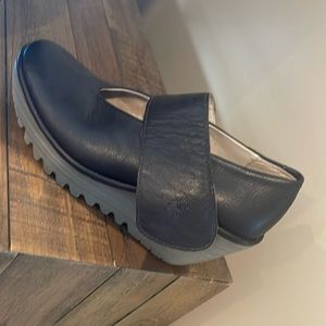 Fly London chocolate brown cross strap shoes